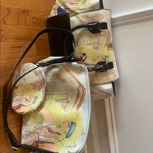 Hand bag with three parts to it